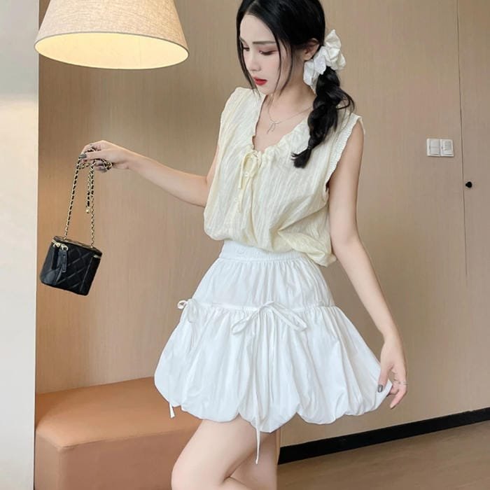 gái xinh mặc váy xếp ly nhẹ nhàng